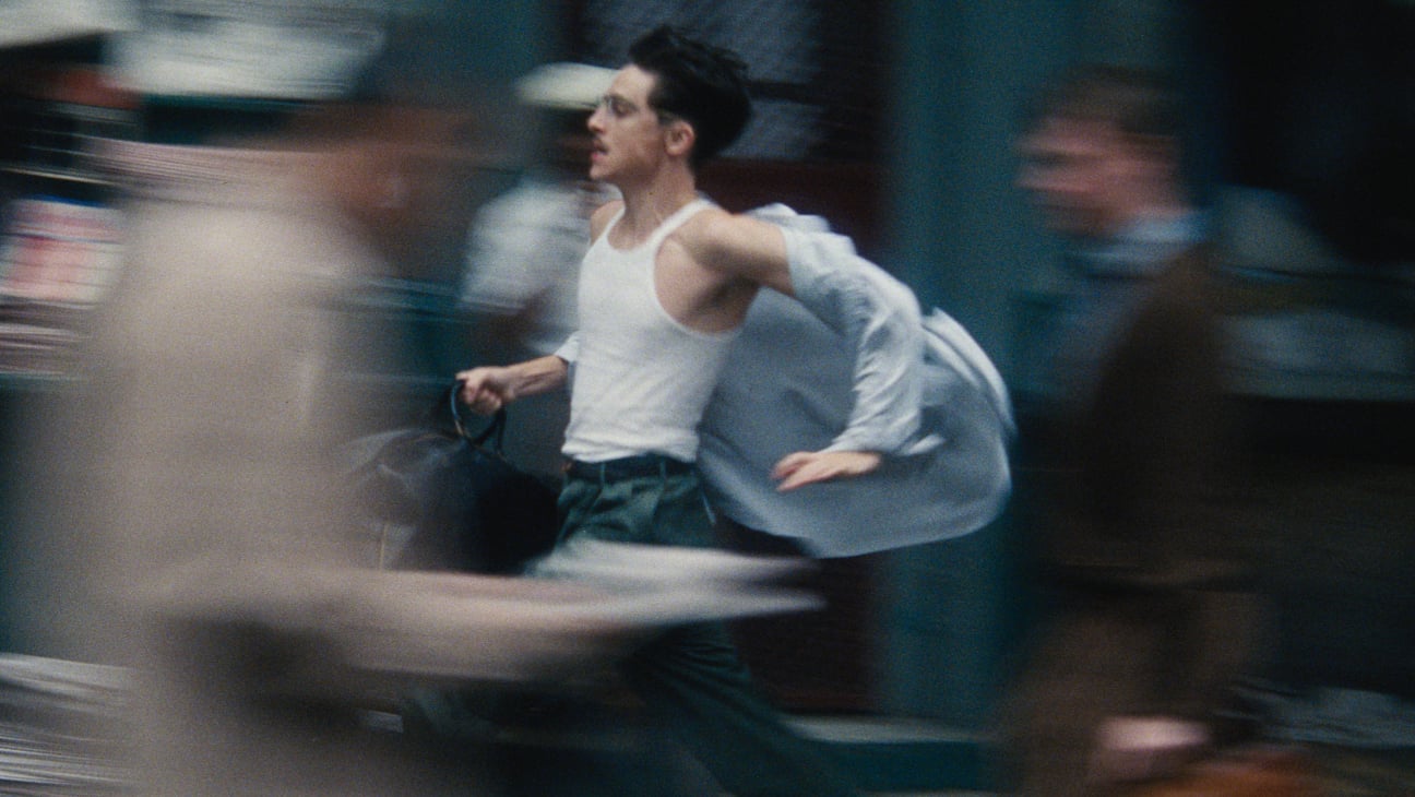Scene from the movie Marty Supreme of Marty running